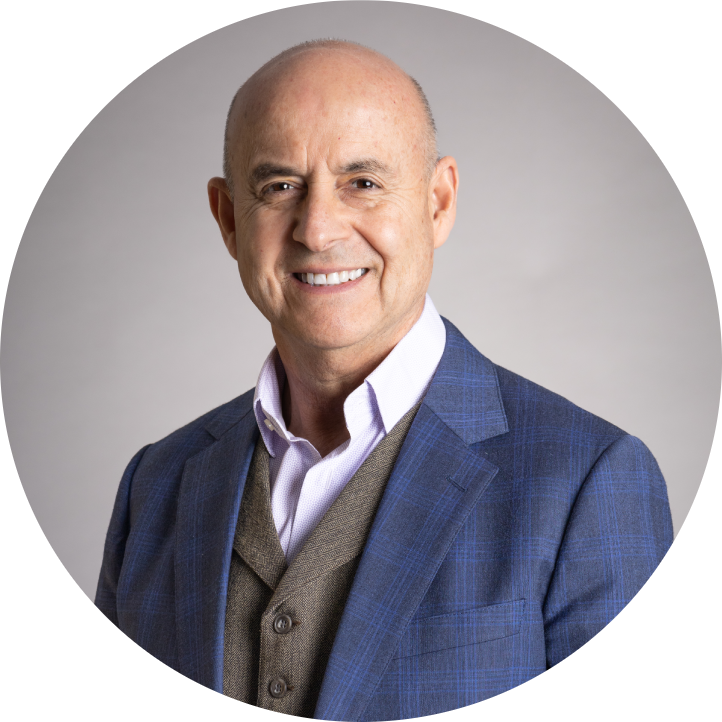Smiling bald man in blue blazer